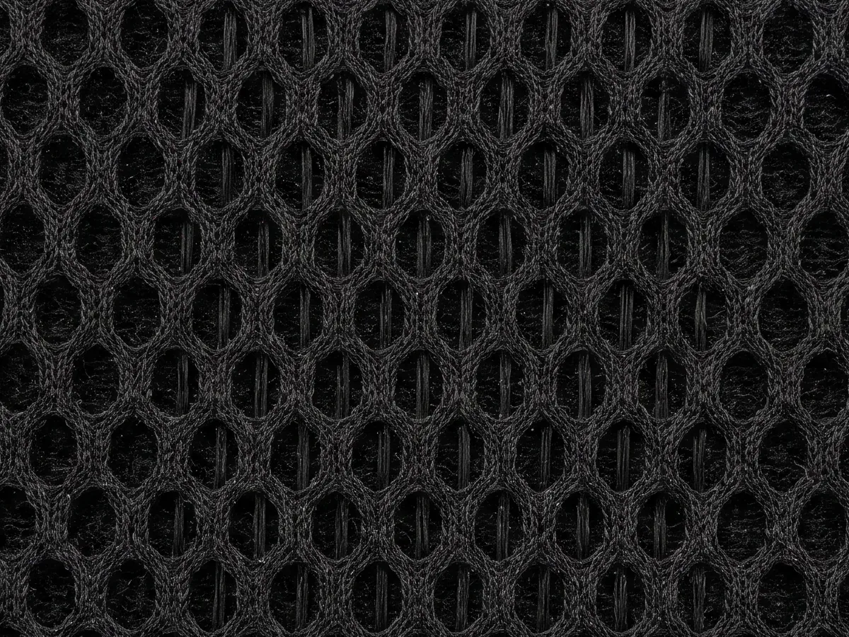 Close view of a spacer mesh face from a single production batch