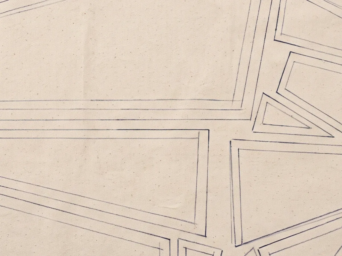 Close view of a canvas fabric face laid out ready to be cut