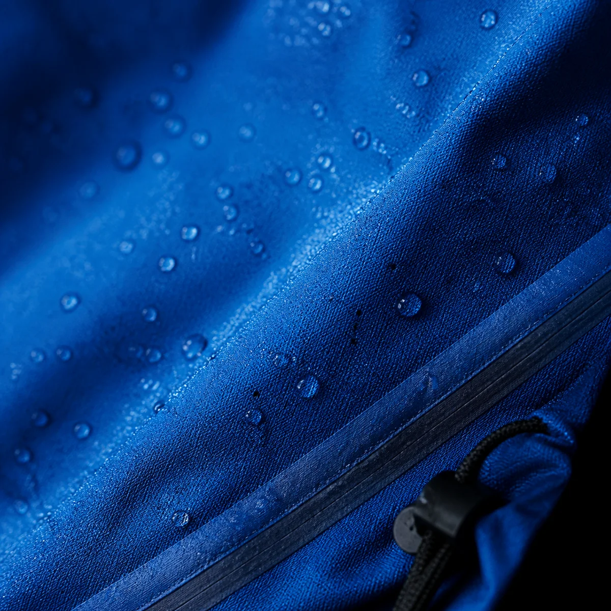 Close-up of a vented waterproof commuter jacket fabric texture