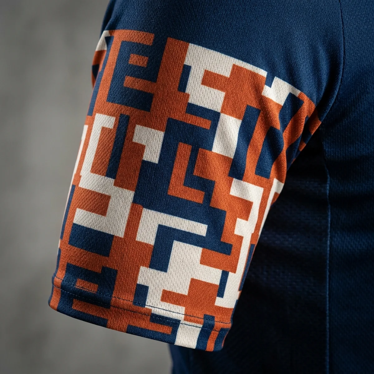 Geometric panel graphic printed across a jersey sleeve