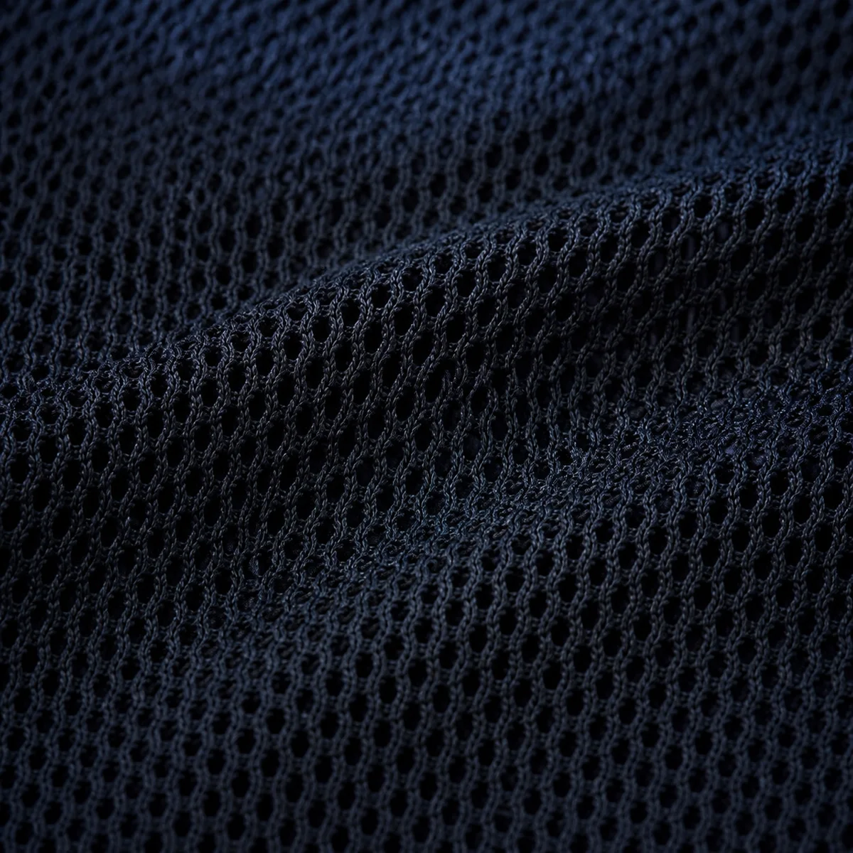 Close-up of a high-ratio mesh performance fabric structure