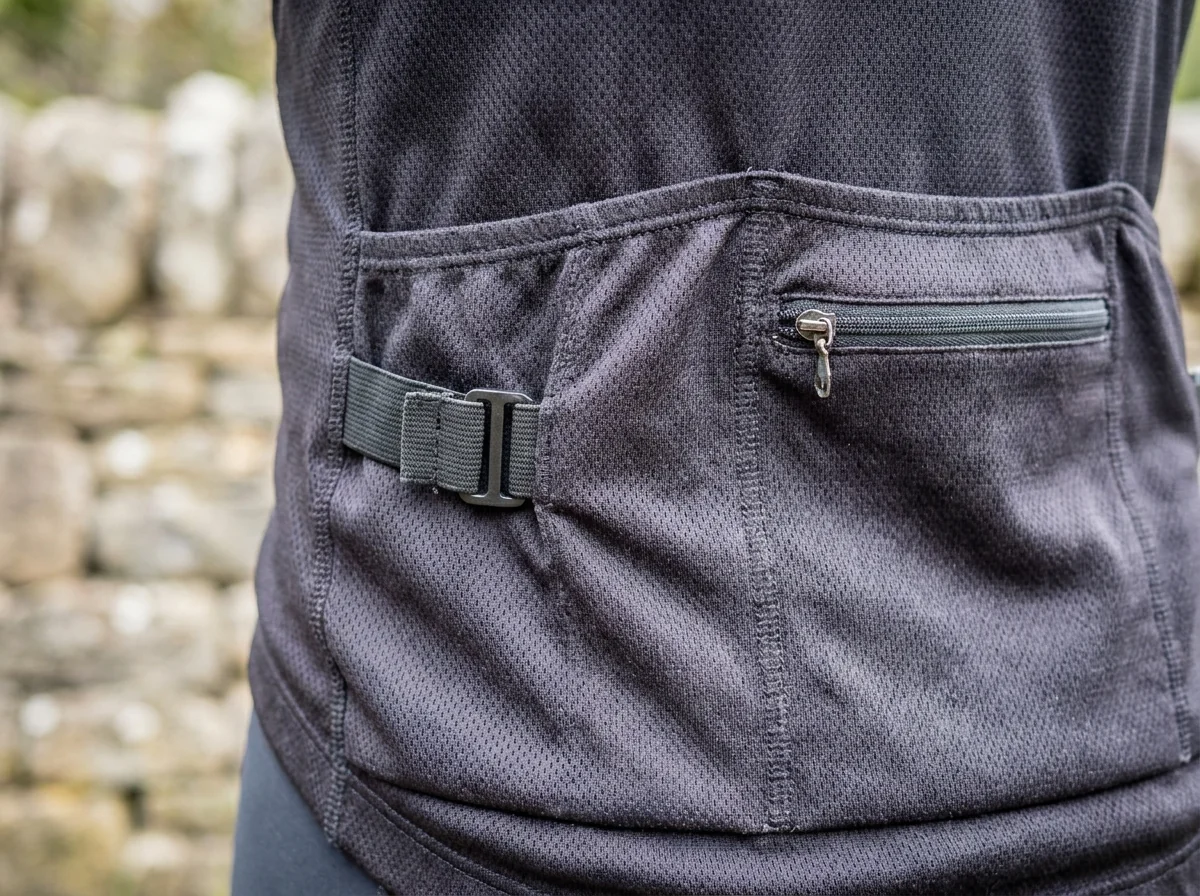 Close-up of a jersey rear pocket and zipper functional detail