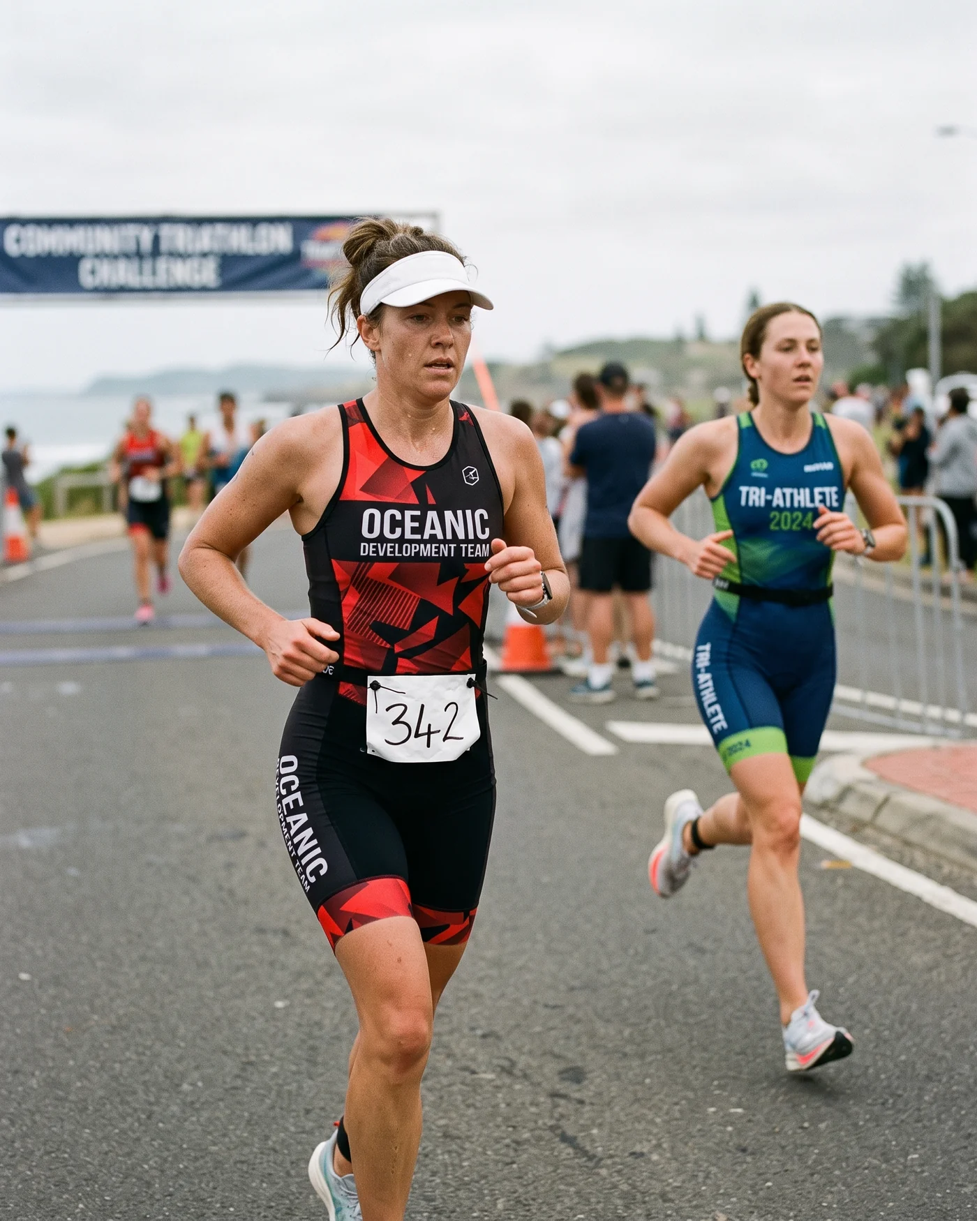 Triathletes running in one-piece triathlon suits