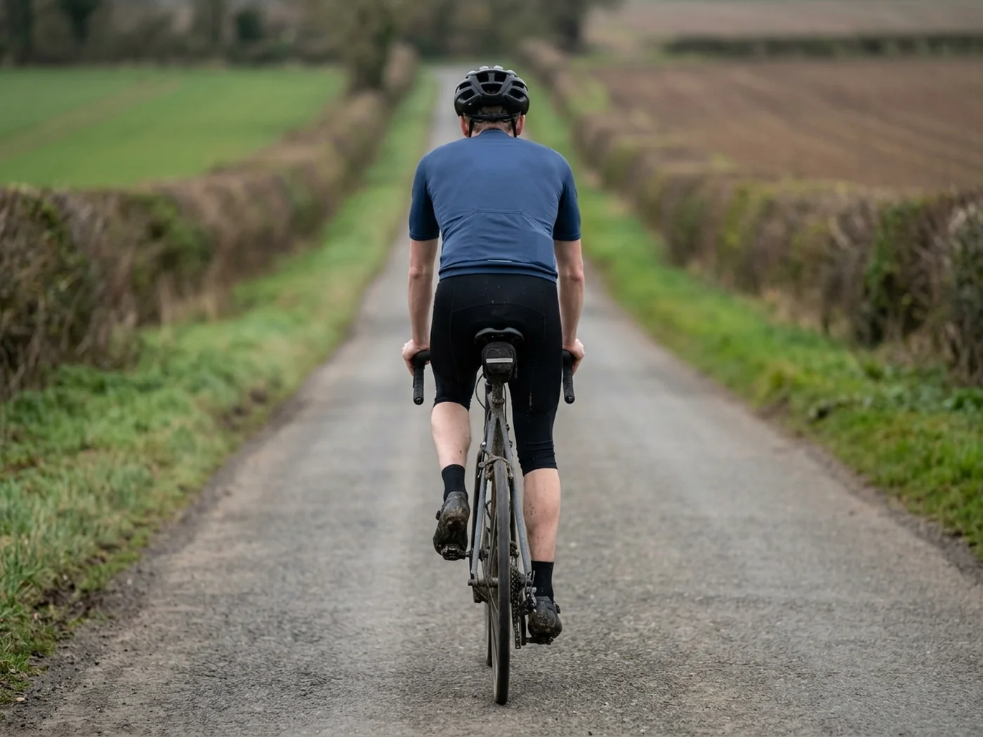 A club rider on a regular training road, the repeating season this page is written around